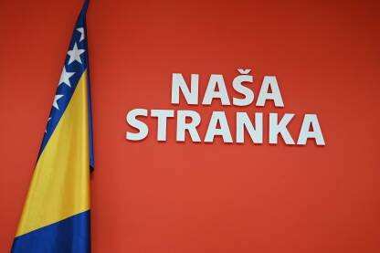 Baner političke stranke "Naša stranka" i zastava BiH. Baner političke stranke "Naša stranka" i zastava BiH. Logo političke stranke. Naša stranka.