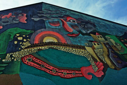 Mural na zidu škole izrađen u skolpu Street Art festivala Mostar 2020 za vrijeme korone. Autor murala je Saša Peševski