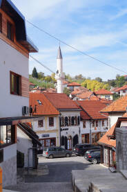 Općina Tešanj Tešanjska čaršija, ulica ispred ulaza u tvrđavu i sahat kulu.