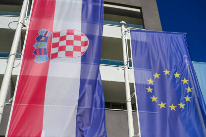 Zastave Hrvatske i Europske unije Zastave Hrvatske i EU. Zastave Hrvatske i Europske unije.